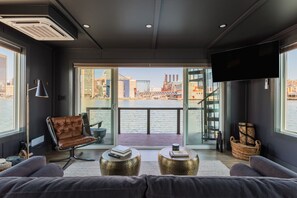 Living area - Luxe Black Houseboat: Inner Harbor Skyline Views (Baltimore)