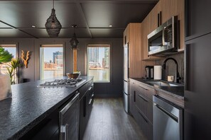 Private kitchen - Luxe Black Houseboat: Inner Harbor Skyline Views (Baltimore)