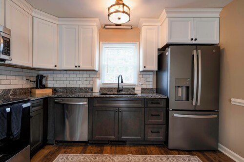 Charming house in a golf course community with lake views and a big yard.