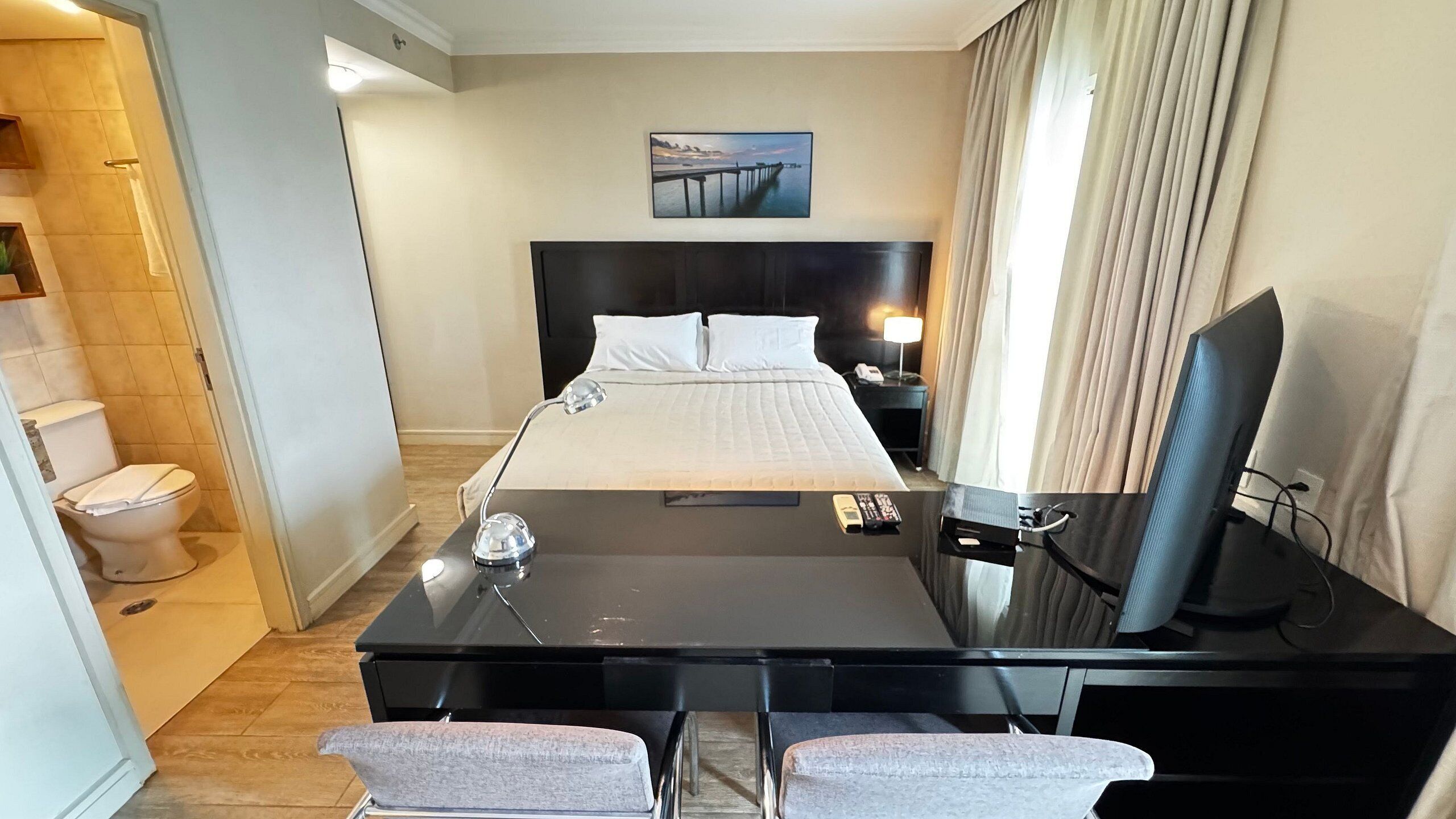 Deluxe Double Room | Minibar, desk, blackout drapes, iron/ironing board