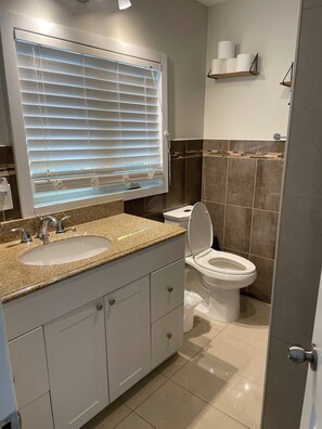 Hair dryer, towels, soap, toilet paper