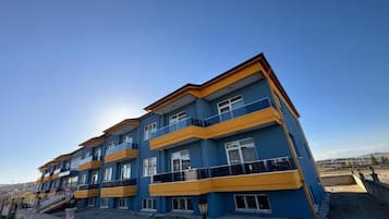 Familjelägenhet - balkong - utsikt mot trädgården | Exteriör