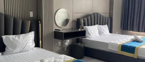 Quadruple Room, 2 Queen Beds, Non Smoking, Air conditioning | Egyptian cotton sheets, premium bedding, free minibar items, desk