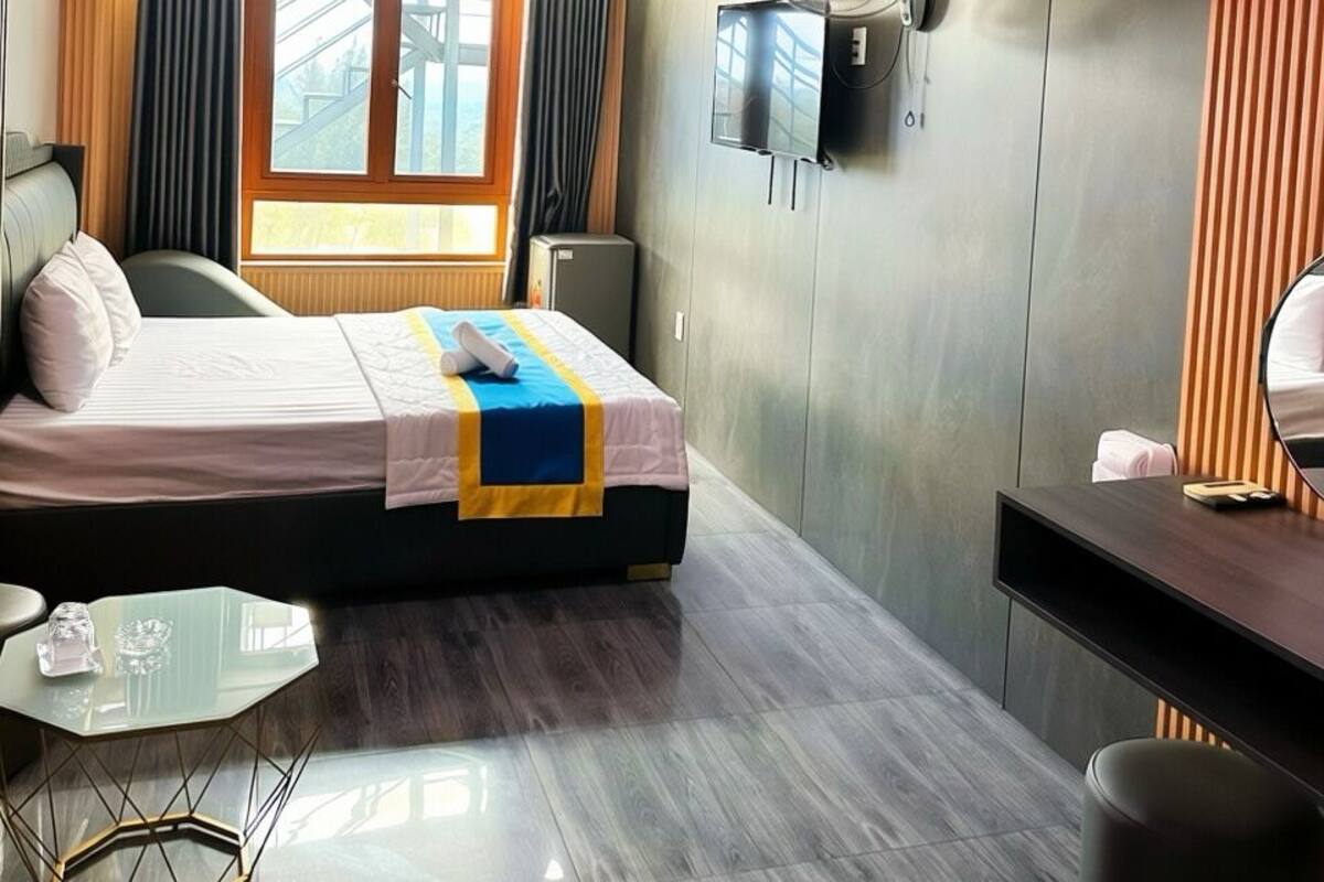 Phòng Executive | Bộ đồ giường cao cấp, minibar với thức ăn, đồ uống miễn phí, bàn