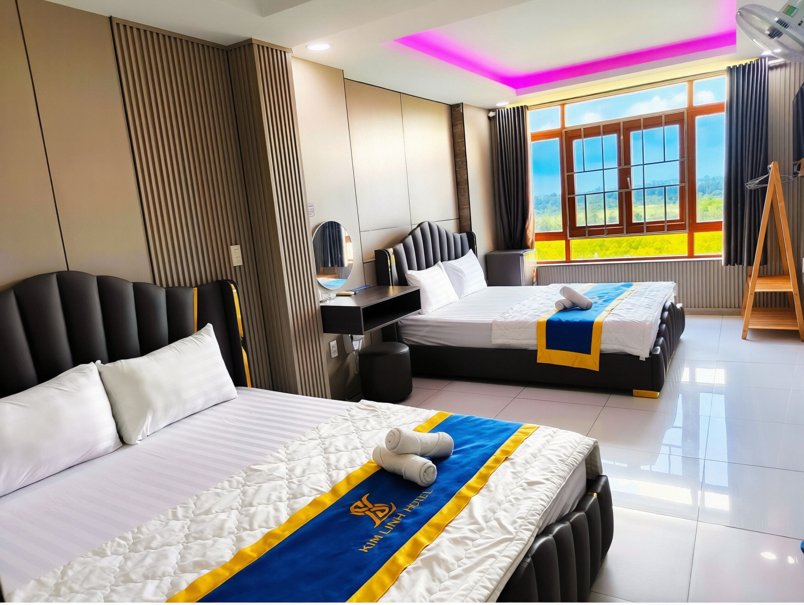 Premium bedding, free minibar items, desk, laptop workspace