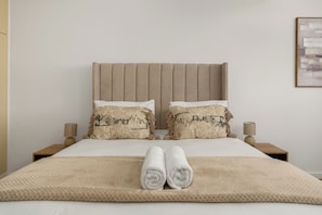 2 chambres, coffres-forts dans les chambres, fer et planche Ă repasser