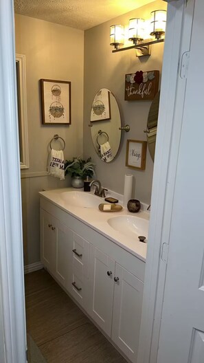 Shower, towels, soap, toilet paper