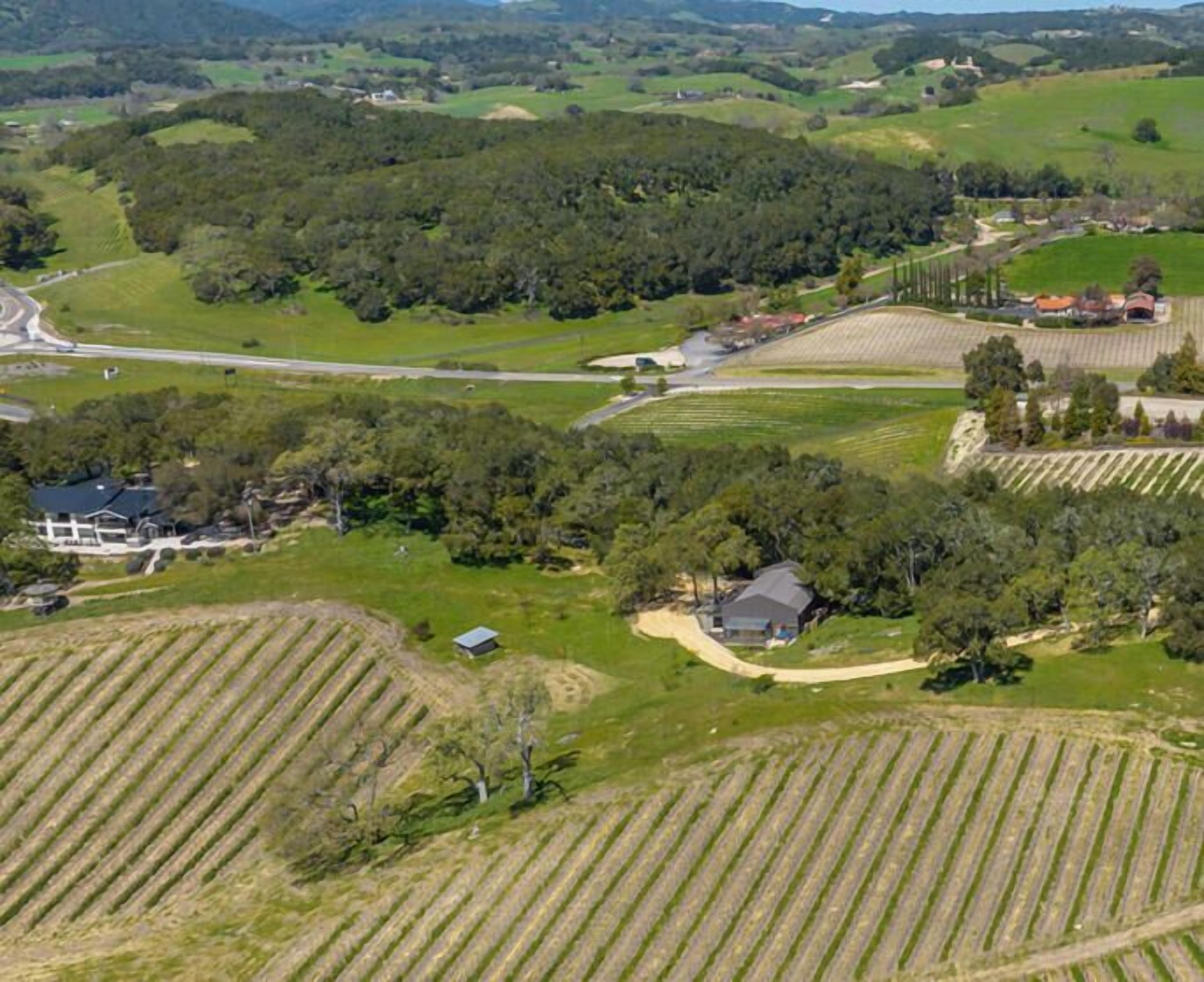 A rural landscape with agricultural fields, a road, and a house labeled 'GARDEN HOUSE.'