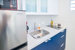 Private kitchen - Cozy Escape | Steps from Beach (San Juan)