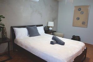 Desk, iron/ironing board, WiFi, bed sheets - Stylish Retreat Apartment Steps from the Beach (San Juan)