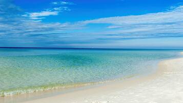 On the beach, sun loungers
