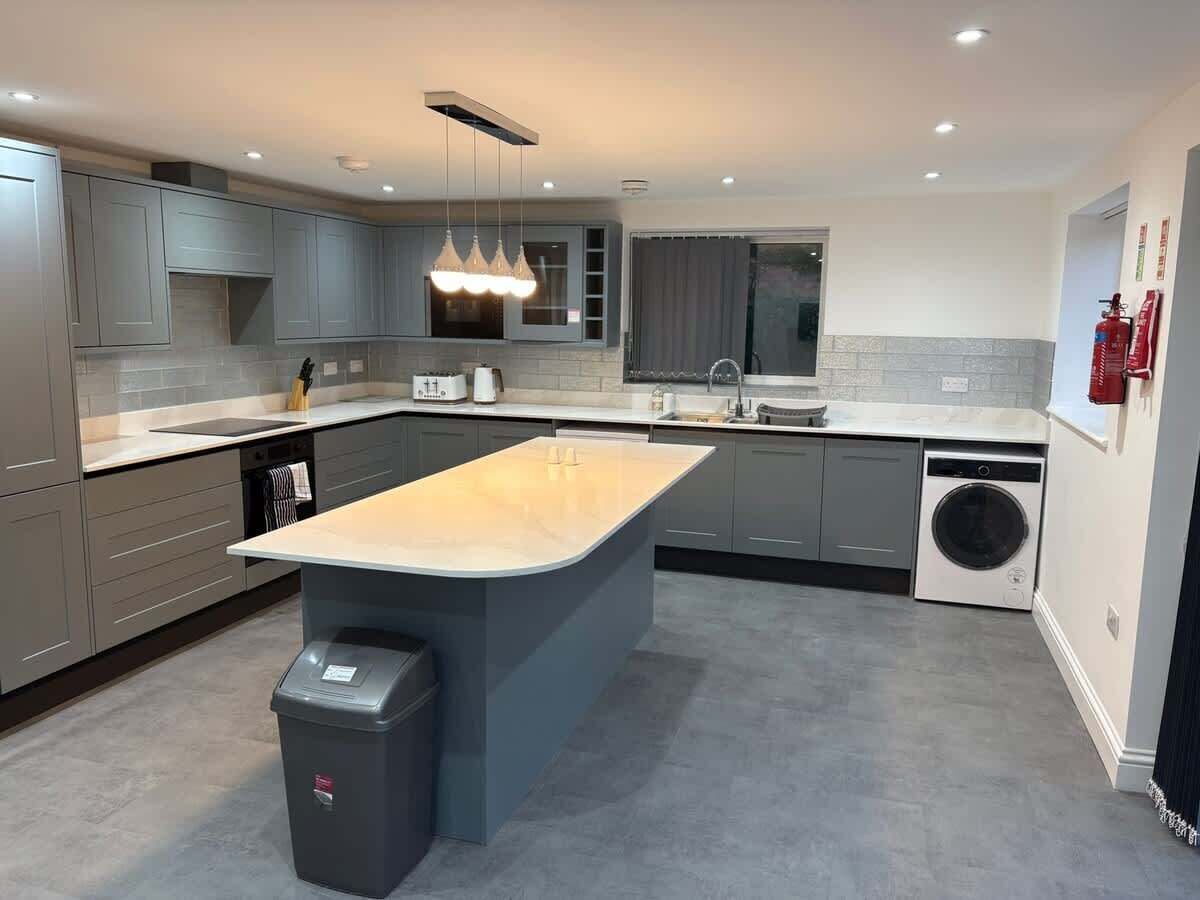 Fridge, microwave, cookware/dishes/utensils, dining tables
