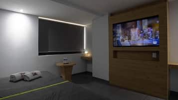 Suite estándar, vista a la ciudad | Escritorio, espacio para trabajar con laptop y wifi gratis