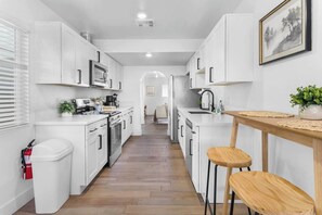 Fridge, microwave, oven, stovetop - Fun Oasis: 6BR, Hot Tub,Pool, Arcade & Park Nearby (North Las Vegas)