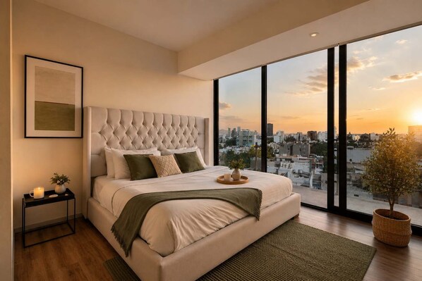 A modern bedroom with a large bed, a city view, and a minimalist design.