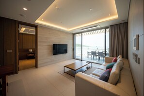 Suíte, vista para o oceano | Área de estar