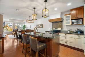 Fridge, microwave, oven, stovetop - Rocky Mountain Retreat | Sleeps 6 • King + Queen (Canmore)