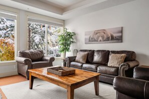 TV, fireplace - Rocky Mountain Retreat | Sleeps 6 • King + Queen (Canmore)