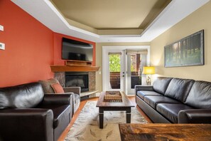 TV, fireplace - Luxury 2BR Mountain Retreat | Pool & Hot Tub (Canmore)