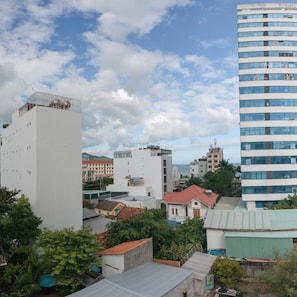 A multi-story building with a flat roof and a series of windows. - Shoho Hotel Nha Trang (Nha Trang)