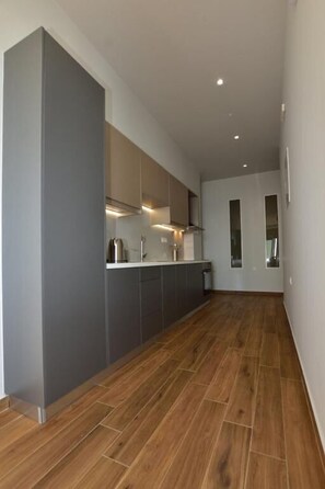 Apartment, Patio, Sea View | Private kitchen - Gonis Grand Luxury Suite (Paleochora)