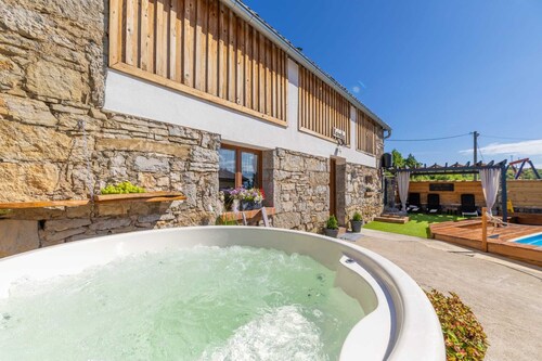Traditional Lika home with pool and jacuzzi surrounded by nature.
