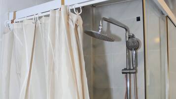 Shower, bidet, towels, soap