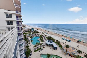 A resort with a pool, beach, and ocean view. - Nana's Sweet Retreat at Ocean Walk (Daytona Beach)