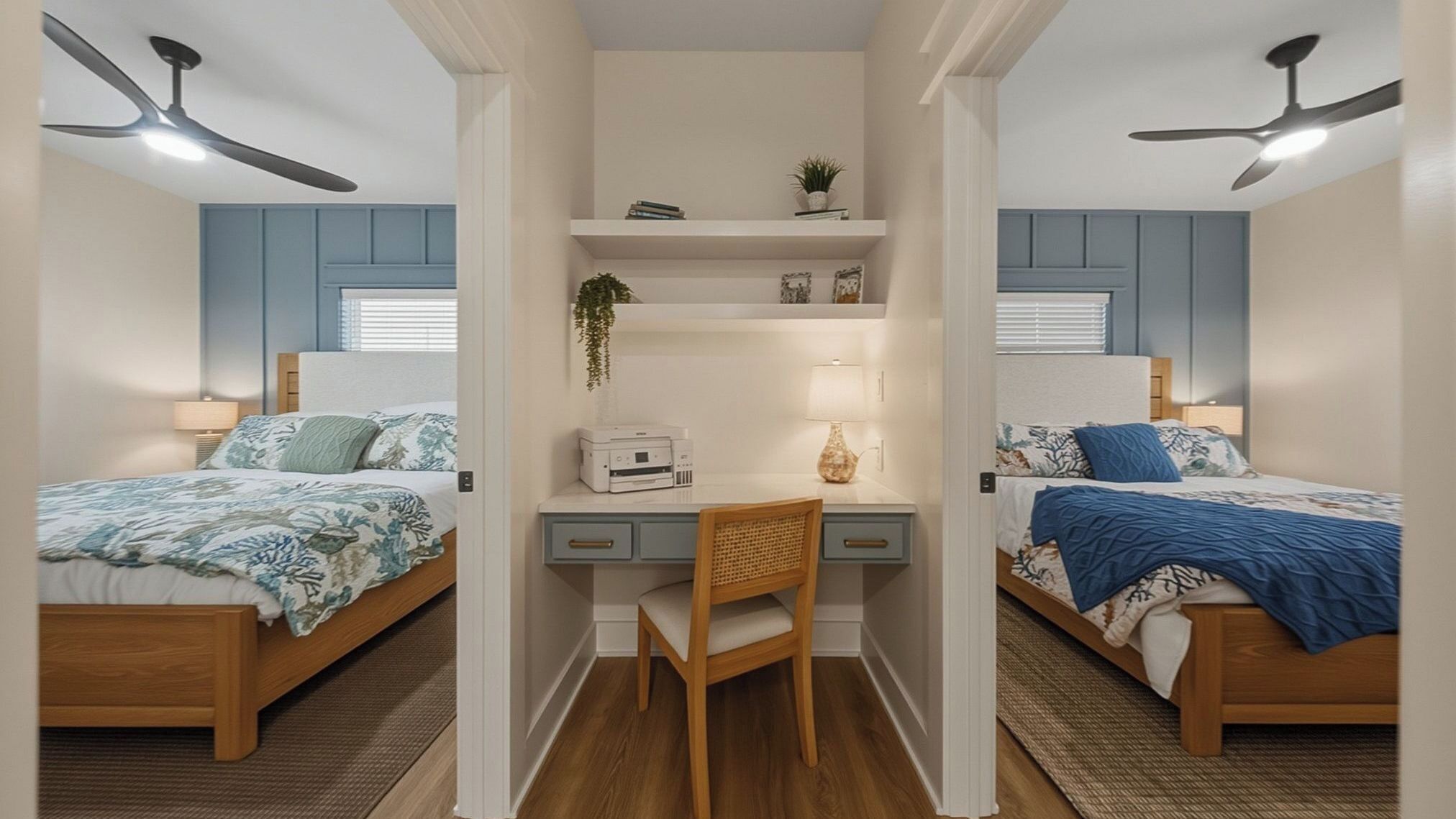 A bedroom with two beds, a desk, and ceiling fans.