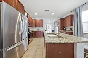 Fridge, microwave, oven, stovetop - Spacious Kissimmee/Orlando 8BR Retreat w/ Private Pool & Fun Themed Bedrooms (Kissimmee)