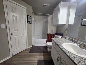 Hair dryer, towels, soap, toilet paper