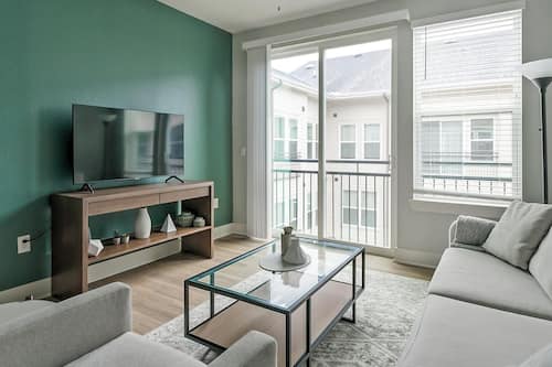 Apartment (2 Bedrooms) | Living area | 50-inch Smart TV with digital channels