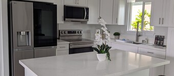 Newly built 3-bedroom house in beautiful Hilo perfect for a relaxing stay.