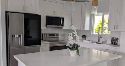 Newly built 3-bedroom house in beautiful Hilo perfect for a relaxing stay.