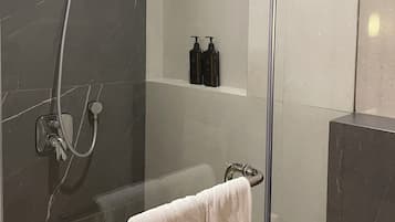 Hair dryer, towels, soap, shampoo