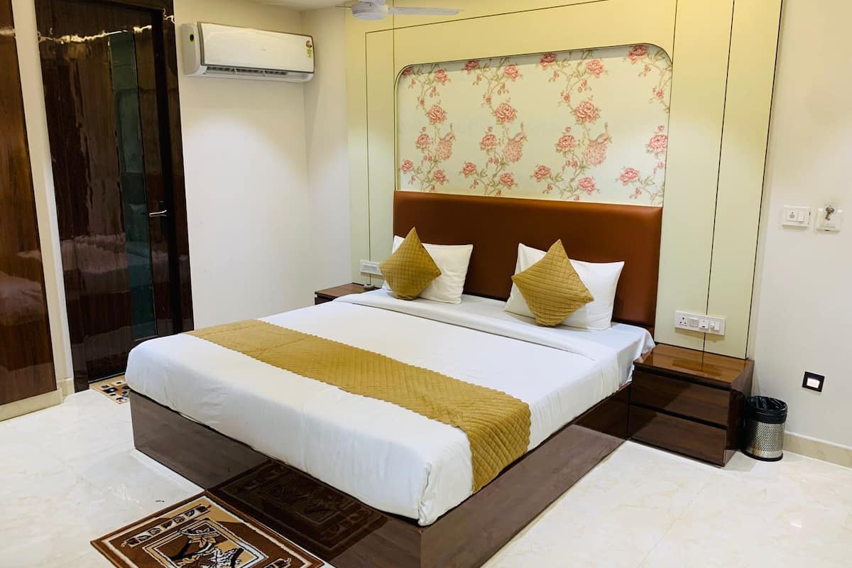 Quarto casal luxo, vista para a cidade