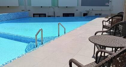 Cozy 1-bedroom condo with AC in beautiful Minglanilla