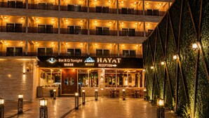 A multi-story hotel with a reception area, Bar.B.Q Night Naran, and Mount Reception. - Mount Hayat Hotel  (Naran)