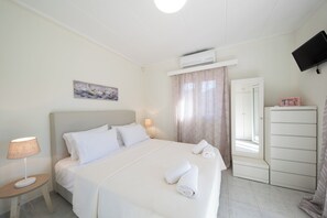4 habitaciones, tabla de planchar con plancha, internet y ropa de cama 