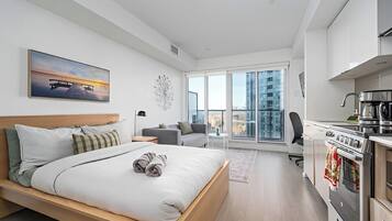 Luxury-Studio, Balkon, Stadtblick | Wohnbereich