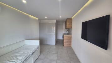 1 bedroom, iron/ironing board, travel crib, bed sheets