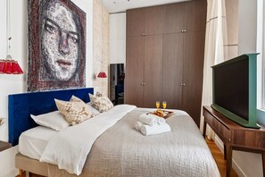 1 slaapkamer, een strijkplank/strijkijzer, reisbedje, gratis wifi