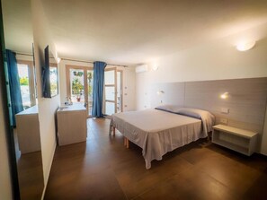 Triple Room, Pool View | Iron/ironing board, free WiFi