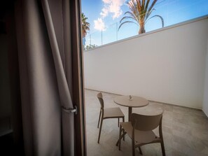 Triple Room, Patio, Courtyard View | Terrace/patio - Palm Beach Resort (Arbatax)