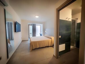 Triple Room, Patio, Courtyard View | Iron/ironing board, free WiFi - Palm Beach Resort (Arbatax)