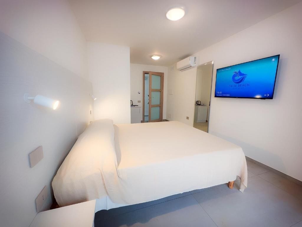 Kamar Triple, patio, pemandangan halaman | Setrika/meja setrika dan Wi-Fi gratis