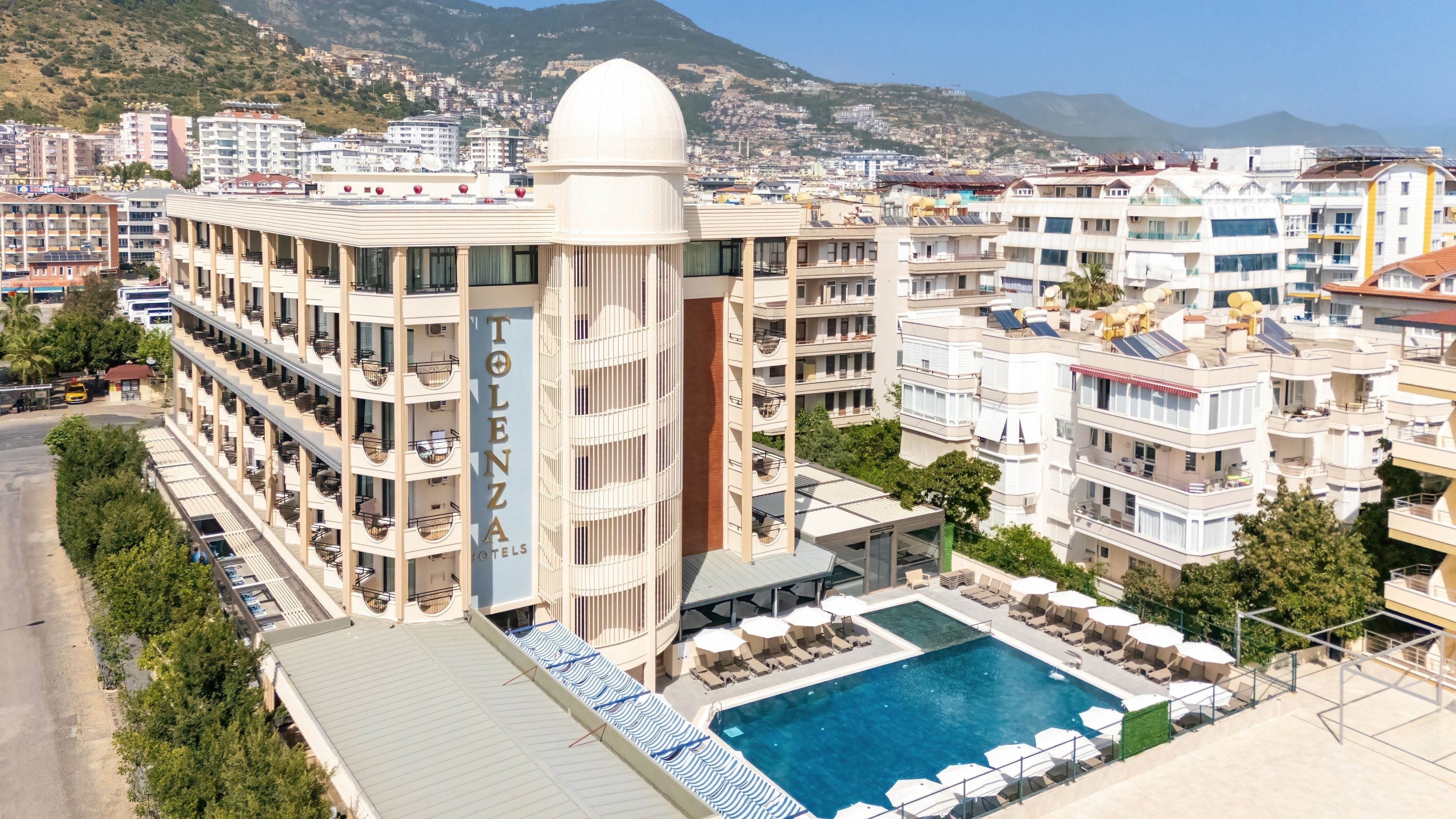 Outdoor pool, open 7:00 AM to 7:00 PM, pool umbrellas, pool loungers
