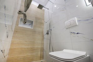 Hair dryer, towels, soap, toilet paper