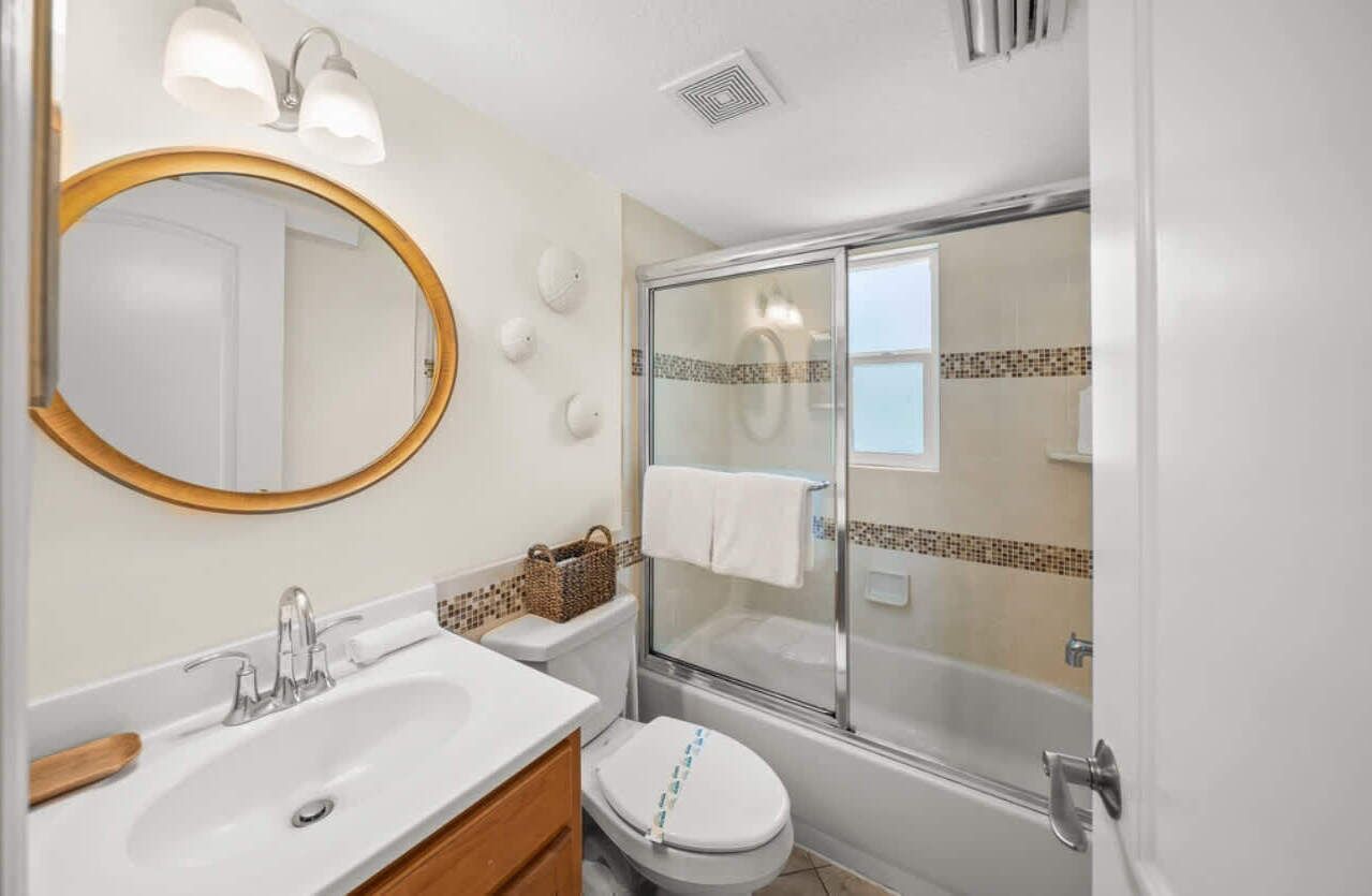 Shower, hair dryer, towels, shampoo