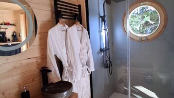 Shower, eco-friendly toiletries, hair dryer, towels